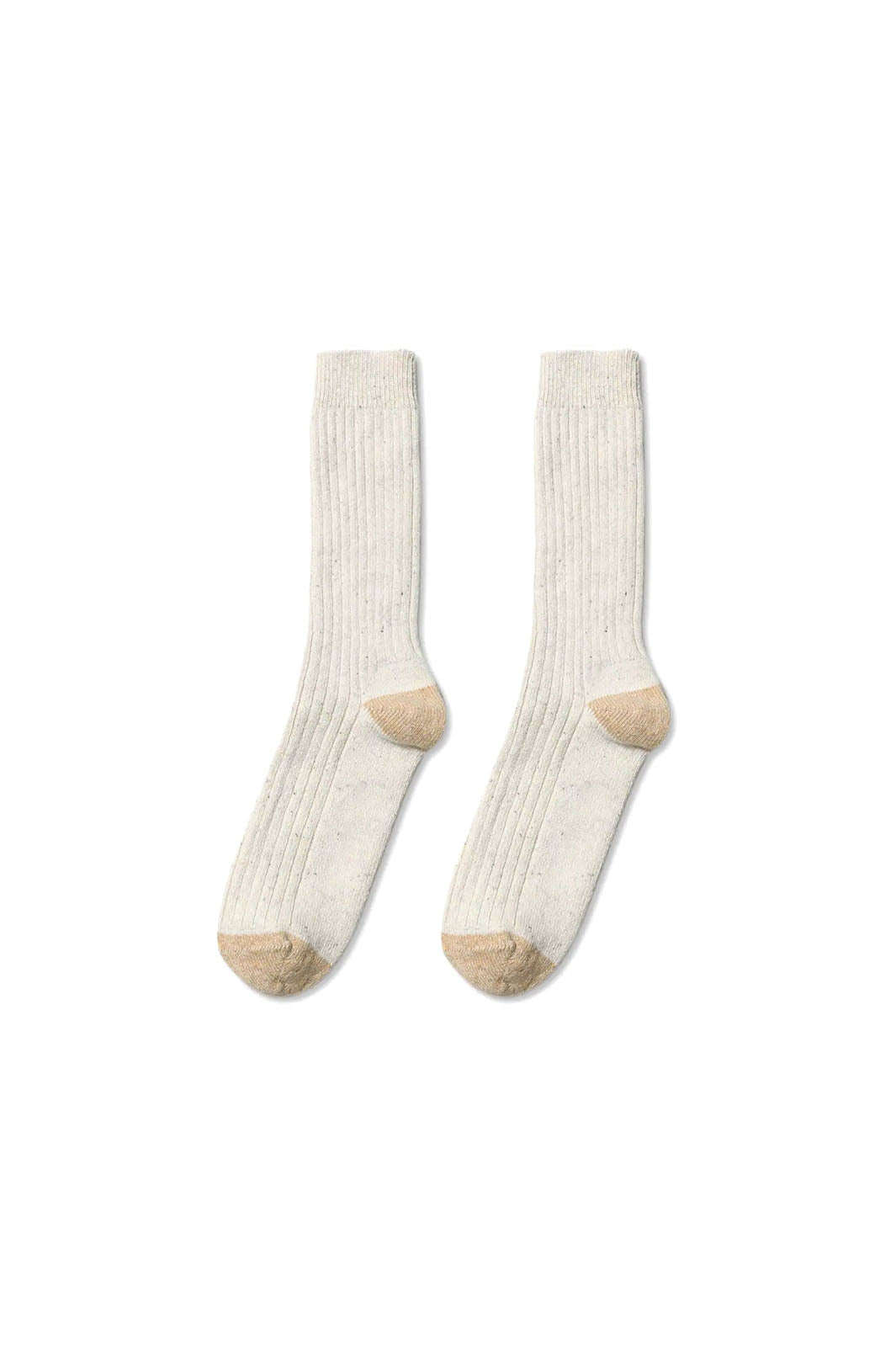 Cream colored and textured knit socks with tan heel and toe.