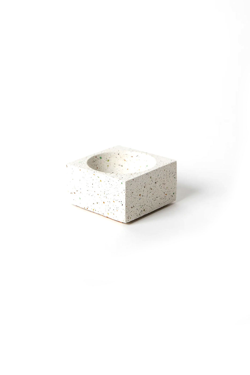 White concrete terrazzo square incense holder with a rounded inset center for the incense stick or cone