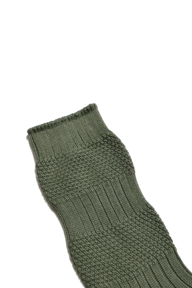 Close Up of Textured Green Far Afield Socks 